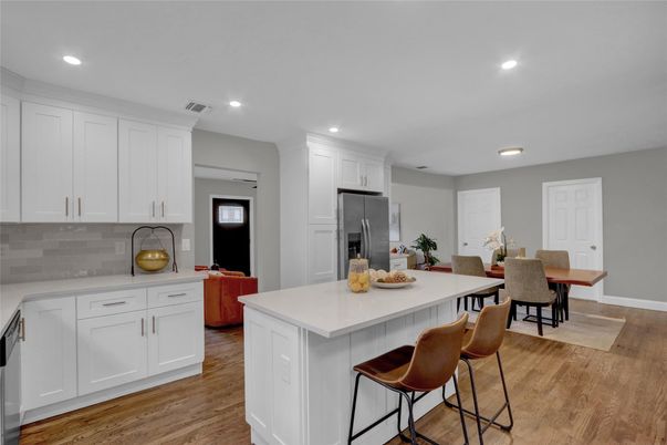 Dining room, Interior, Kitchen, Recessed Lighting, Stainless Steel Appliances, Wood Texture Flooring