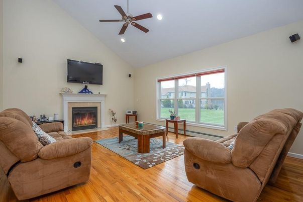 Billiard Table, Fireplace, Game Room, Interior, Living room, Recessed Lighting, Wood Texture Flooring