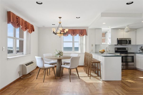 Chandelier, Dining room, Interior, Kitchen, Recessed Lighting, Stainless Steel Appliances, Water, Wood Texture Flooring