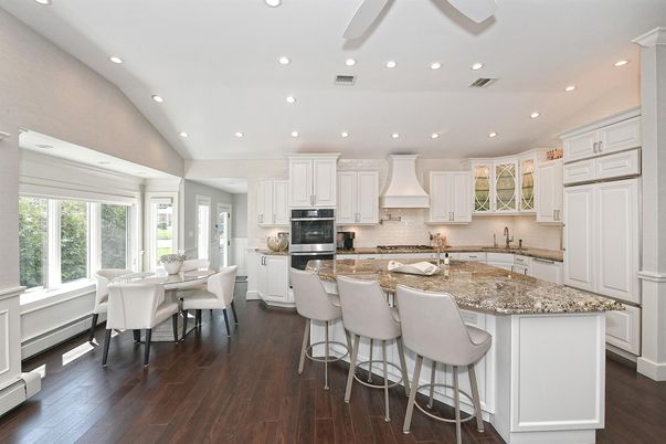 Dining room, Interior, Kitchen, Recessed Lighting, Stainless Steel Appliances, Wood Texture Flooring