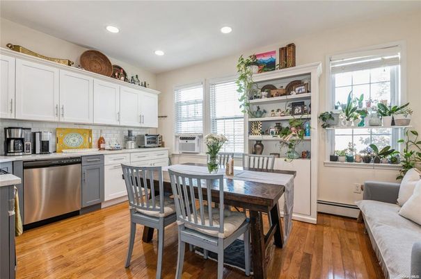 Dining room, Interior, Kitchen, Recessed Lighting, Stainless Steel Appliances, Wood Texture Flooring