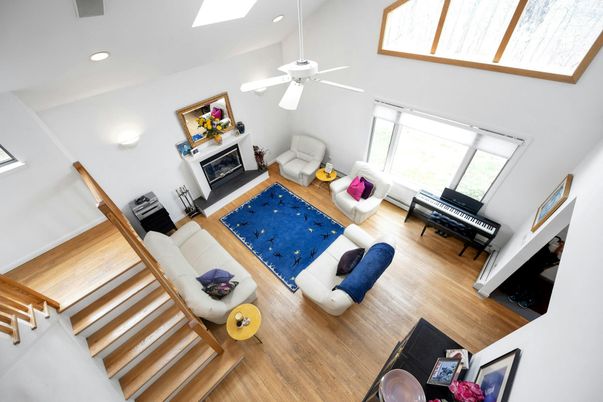 Fireplace, Interior, Living room, Piano, Recessed Lighting, Wood Texture Flooring