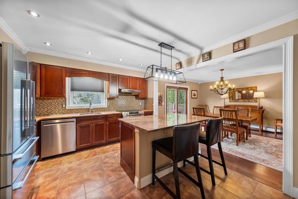 Chandelier, Dining room, Interior, Kitchen, Recessed Lighting, Stainless Steel Appliances, Wood Texture Flooring