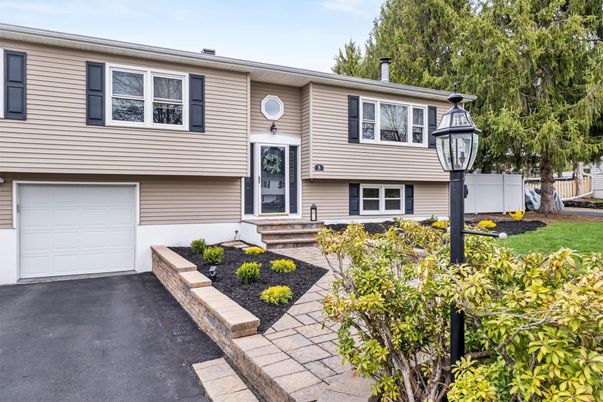 Attached, Exterior, Facade, Raised Ranch