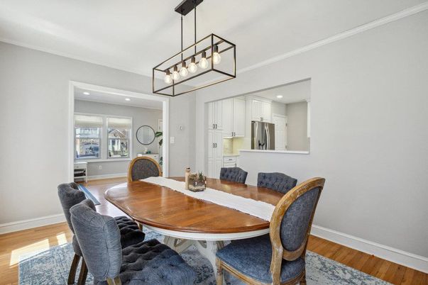 Dining room, Interior, Kitchen, Pendant Lights, Recessed Lighting, Stainless Steel Appliances, Wood Texture Flooring
