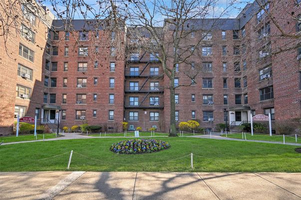 Exterior, Facade, Brick Facade, Condo Building