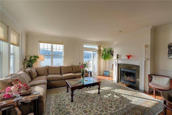 Fireplace, Interior, Living room, Recessed Lighting, Water, Wood Texture Flooring