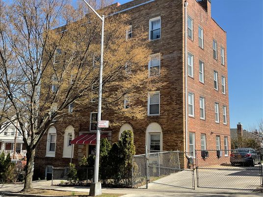 Exterior, Facade, Brick Facade, Condo Building