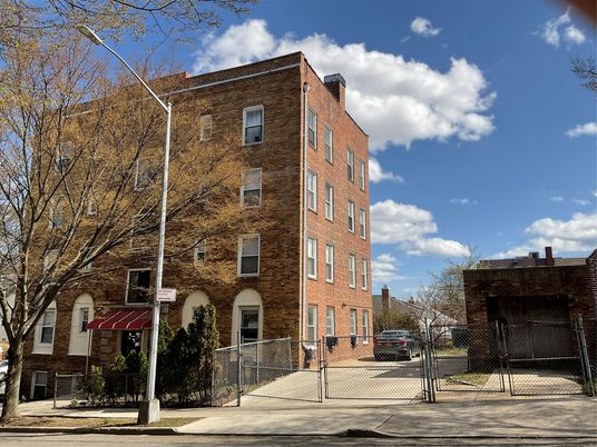 Exterior, Facade, Brick Facade, Condo Building