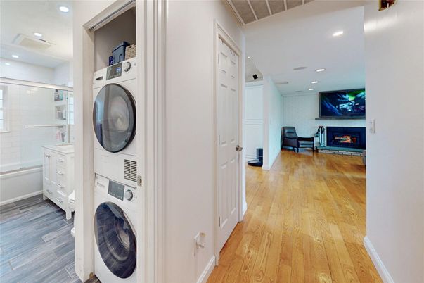 Fireplace, Interior, Recessed Lighting, Utility Closets, Washer, Wood Texture Flooring