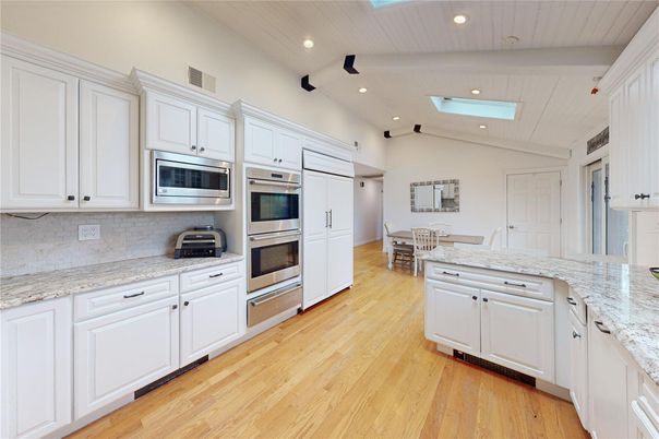 Dining room, Interior, Kitchen, Recessed Lighting, Stainless Steel Appliances, Wood Texture Flooring