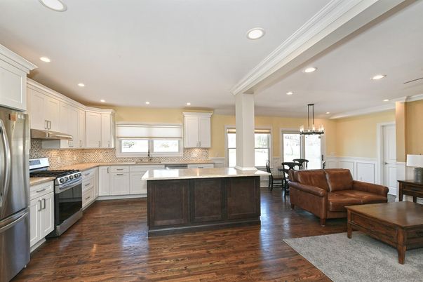 Dining room, Interior, Kitchen, Living room, Pendant Lights, Recessed Lighting, Stainless Steel Appliances, Wood Texture Flooring