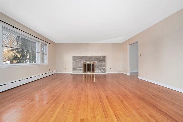 Empty room, Fireplace, Interior, Stone Walls, Wood Texture Flooring