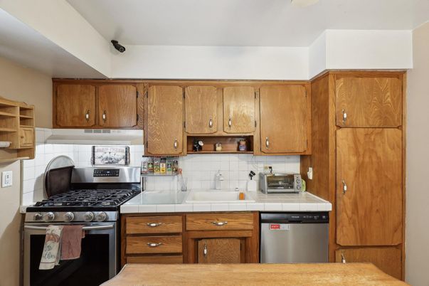 Interior, Kitchen, Stainless Steel Appliances, Tile Countertops