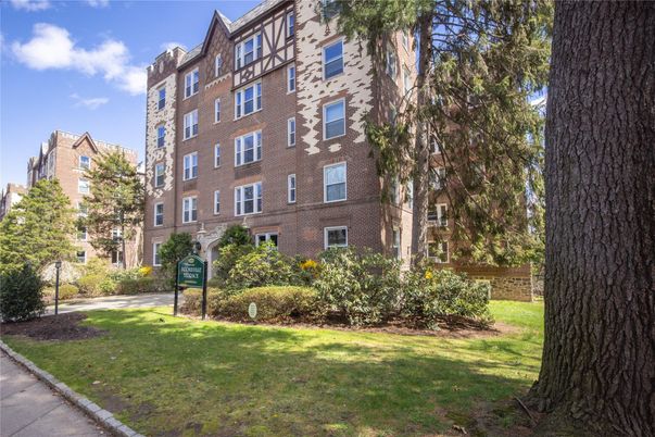 Backyard, Exterior, Facade, Brick Facade, Condo Building