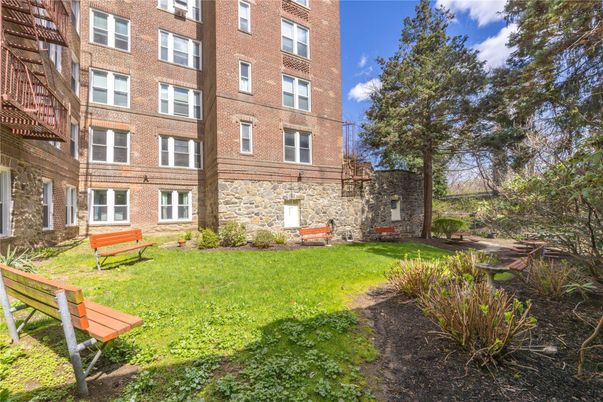 Backyard, Exterior, Facade, Brick Facade, Condo Building