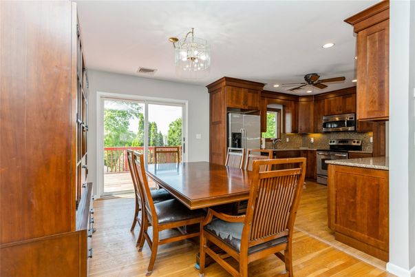 Dining room, Interior, Kitchen, Recessed Lighting, Stainless Steel Appliances, Wood Texture Flooring