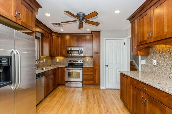 Interior, Kitchen, Recessed Lighting, Stainless Steel Appliances, Wood Texture Flooring