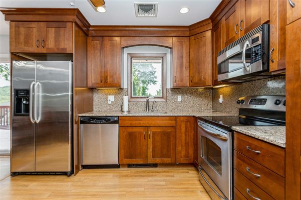 Interior, Kitchen, Recessed Lighting, Stainless Steel Appliances, Wood Texture Flooring