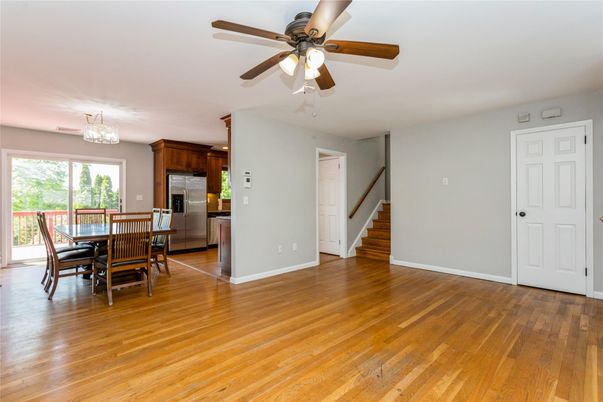 Chandelier, Dining room, Interior, Kitchen, Stainless Steel Appliances, Wood Texture Flooring