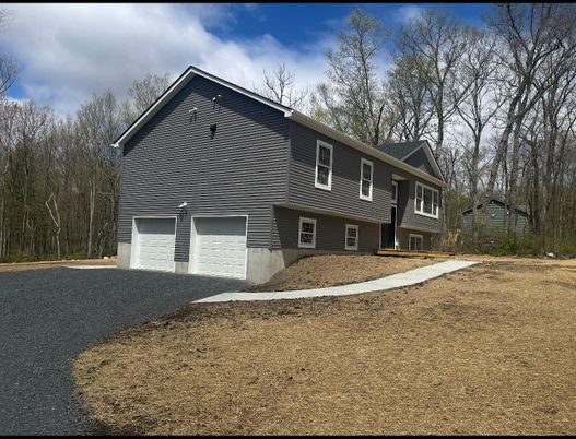 Attached, Exterior, Facade, Raised Ranch