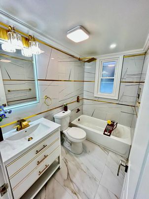 Bathroom, Dual Sink Vanities, Interior, Marble, Marble Walls, Recessed Lighting