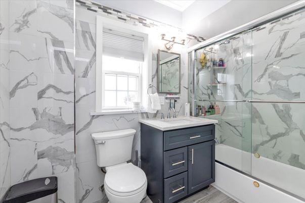 Bathroom, Glass Shower, Interior, Marble Walls, Wood Texture Flooring