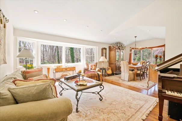 Chandelier, Dining room, Interior, Living room, Piano, Recessed Lighting, Wood Texture Flooring