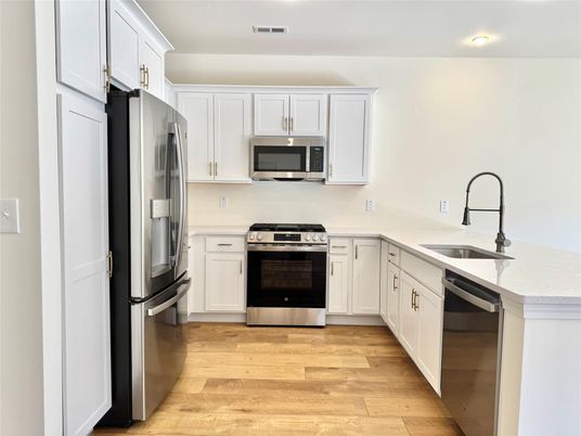Interior, Kitchen, Recessed Lighting, Stainless Steel Appliances, Wood Texture Flooring