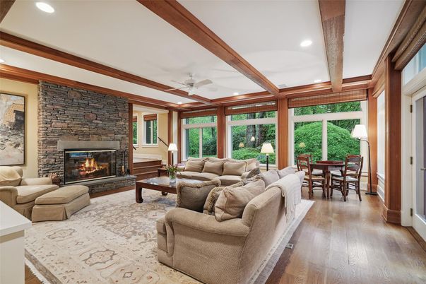 Dining room, Fireplace, Interior, Living room, Recessed Lighting, Stone Walls, Wooden Beams, Wood Texture Flooring
