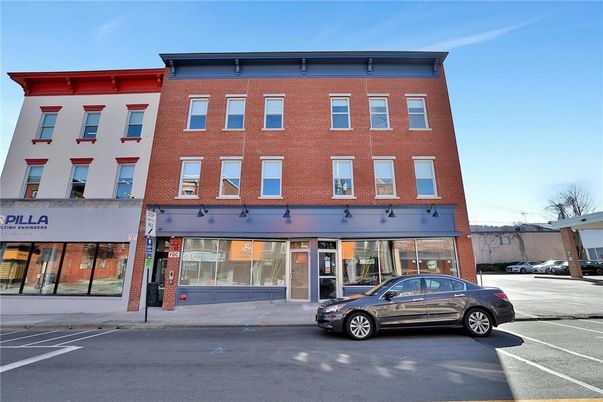 Exterior, Facade, Brick Facade, Condo Building