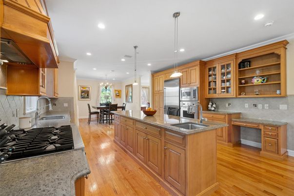 Chandelier, Dining room, Interior, Kitchen, Pendant Lights, Recessed Lighting, Stainless Steel Appliances, Wood Texture Flooring