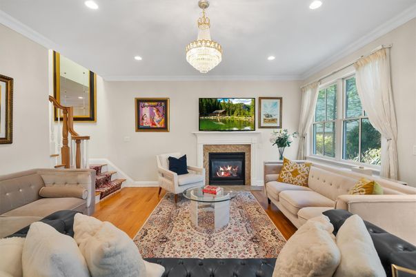 Chandelier, Fireplace, Interior, Living room, Recessed Lighting, Wood Texture Flooring