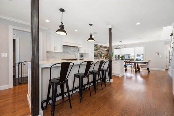 Chandelier, Dining room, Interior, Kitchen, Pendant Lights, Recessed Lighting, Stainless Steel Appliances, Wood Texture Flooring