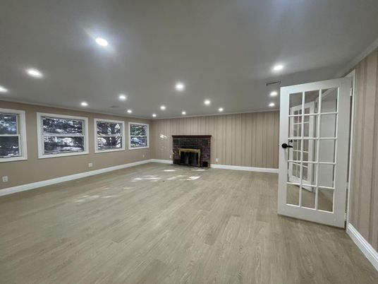 Empty room, Fireplace, Interior, Recessed Lighting, Wood Texture Flooring