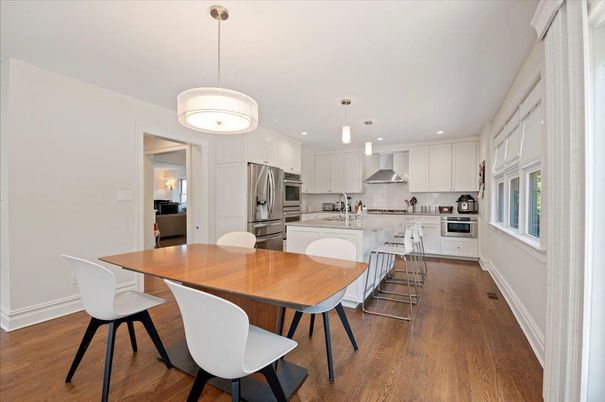 Dining room, Interior, Kitchen, Pendant Lights, Recessed Lighting, Stainless Steel Appliances, Wood Texture Flooring