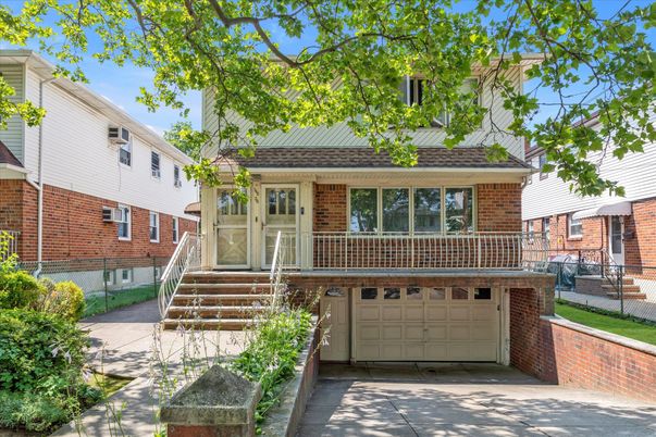 Attached, Exterior, Facade, Brick Facade, American Foursquare