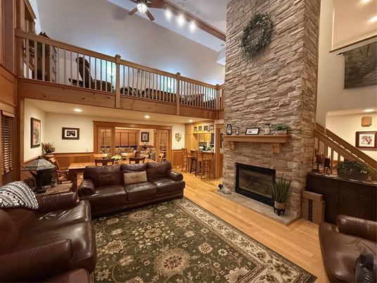 Dining room, Fireplace, Interior, Living room, Recessed Lighting, Wood Texture Flooring