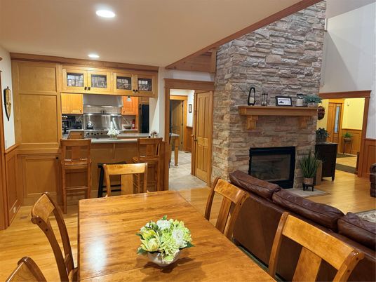 Dining room, Fireplace, Interior, Kitchen, Living room, Recessed Lighting, Stainless Steel Appliances, Stone Walls