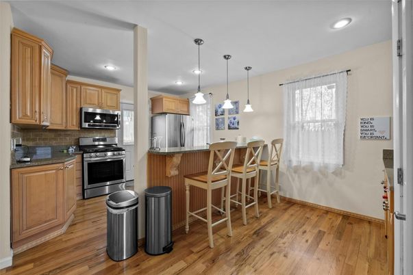 Interior, Kitchen, Pendant Lights, Recessed Lighting, Stainless Steel Appliances, Wood Texture Flooring