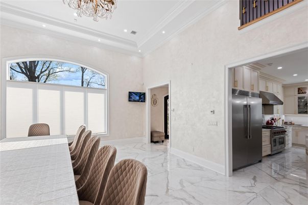 Chandelier, Dining room, Interior, Kitchen, Marble, Recessed Lighting, Stainless Steel Appliances