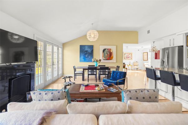 Chandelier, Dining room, Fireplace, Interior, Kitchen, Living room, Stainless Steel Appliances, Wood Texture Flooring