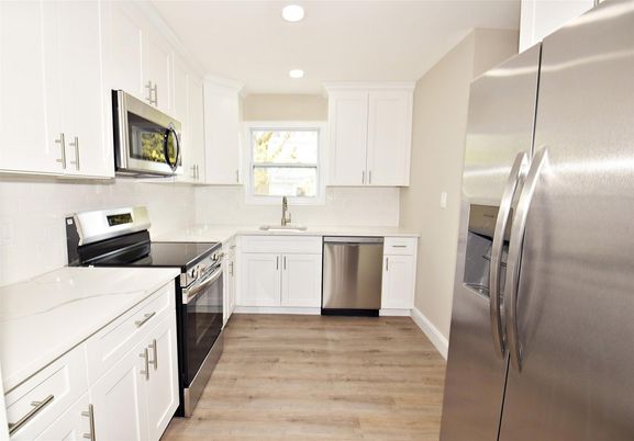 Interior, Kitchen, Recessed Lighting, Stainless Steel Appliances, Wood Texture Flooring