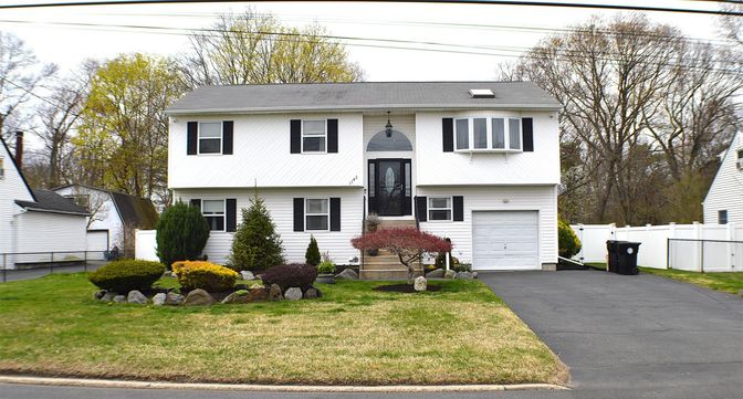 Attached, Exterior, Facade, Raised Ranch