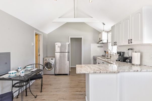 Interior, Kitchen, Pendant Lights, Washer, Wood Texture Flooring