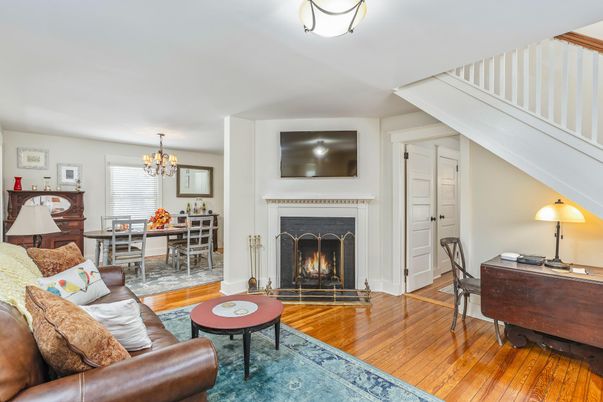 Chandelier, Dining room, Fireplace, Interior, Living room, Wood Texture Flooring