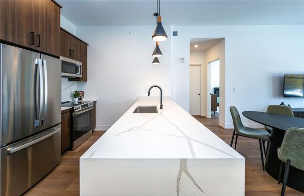Interior, Kitchen, Pendant Lights, Recessed Lighting, Stainless Steel Appliances, Wood Texture Flooring
