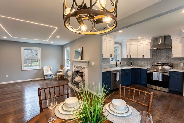 Chandelier, Fireplace, Interior, Kitchen, Recessed Lighting, Stainless Steel Appliances, Wood Texture Flooring
