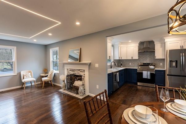 Fireplace, Interior, Kitchen, Recessed Lighting, Stainless Steel Appliances, Wood Texture Flooring