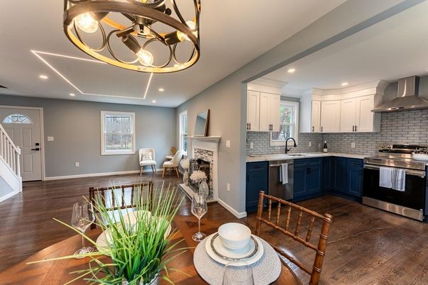 Chandelier, Fireplace, Interior, Kitchen, Recessed Lighting, Stainless Steel Appliances, Wood Texture Flooring